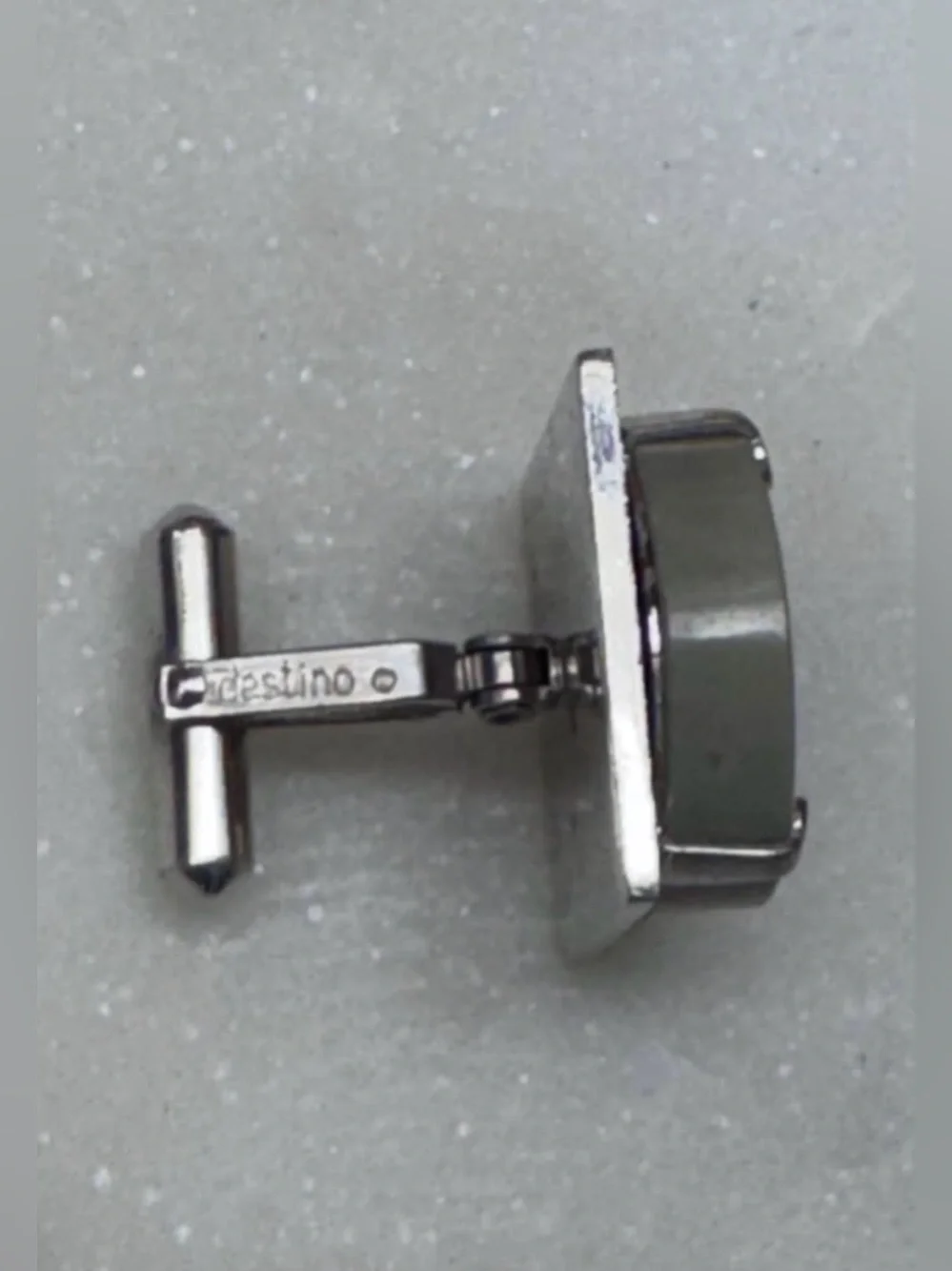 Vintage mid-century Destino cufflinks feature distinctive domed gray stones.